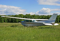 N2012E @ KFWN - Somewhere amid that tall grass is a Cessna Skyhawk. - by Daniel L. Berek
