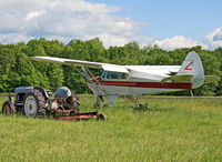 N7019B @ KFWN - Lovely to find this classic Tri-Pacer!  Built in 1956, she appears to be about the same age as the Ford tractor next to her. - by Daniel L. Berek