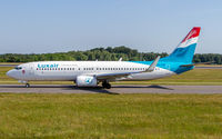 LX-LGU @ ELLX - taxying to the active - by Friedrich Becker
