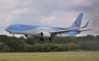 G-FDZF @ EGHH - Snazzy wingtips ! - by John Coates