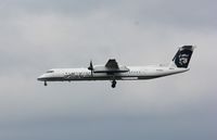 N410QX @ KSEA - DHC-8-402