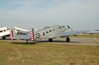 N214CR @ LAL - 1958 Beech AT-11, N214CR, at 2014 Sun n Fun, Lakeland Linder Regional Airport, Lakeland, FL - by scotch-canadian