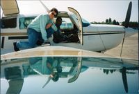 G-BHBI @ EGLD - Me buying G-BHBI from the previous owner (Barry?) circa 1991 at Denham Aerodrome. - by Mike Smith