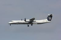 N405QX @ KSEA - DHC-8-402
