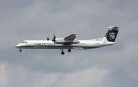 N420QX @ KSEA - DHC-8-402