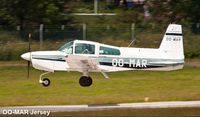 OO-MAR @ EGJJ - On very short final about to touch down ..landing runway 27 at  Jersey International Airport ( Channel Islands UK ) on Wednesday, June 14th . - by Mike Illien