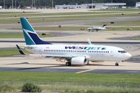 C-FWSO @ TPA - West Jet 737-700 - by Florida Metal