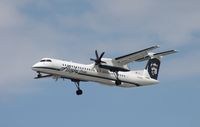 N404QX @ KSEA - DHC-8-402