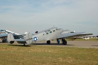 N7381C @ LAL - 1944 Beech C18S, N7381C, at 2014 Sun n Fun, Lakeland Linder Regional Airport, Lakeland, FL - by scotch-canadian