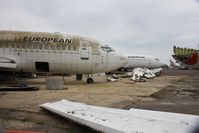 G-FIGP @ EGHH - With G-CEAH in the scrap area - by John Coates