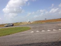 N379VM - While driving to Laredo on TX-44 near Robstown, TX, N379VM lined up on a dirt runway for takeoff. - by Ellexis