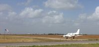 N379VM - While driving to Laredo on TX-44 near Robstown, TX, N379VM lined up on a dirt runway for takeoff. Cropped original photo at 100% resolution. - by Ellexis