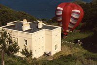 G-BKXC - Balloon prepared for take-off from Lundy, in front of the Marisco Tavern and carrying the first balloon post from the island. - by Ed Carson