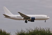 ZS-DJI @ EGHH - Arriving at its new home - by John Coates