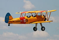N26M @ KRDG - The Mid Atlantic Air Museum's Stearman launches into the summer evening sky with a lucky passenger aloft. - by Daniel L. Berek