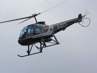 G-CUDY @ EGFH - Visiting helicopter departing the airport. - by Roger Winser