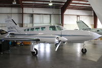 N6387X @ KIOW - Among aircraft displayed in a hangar during the air show - by Glenn E. Chatfield