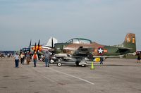 N4168E @ LAL - 1956 North American T-28C, N4168E, at 2014 Sun n Fun, Lakeland Linder Regional Airport, Lakeland, FL - by scotch-canadian