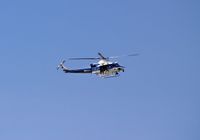N412PP - This was taken in Washington, DC on July 4, 2014. Those are police gunners on the helicopter which was circling around and hovering over the Lincoln Memorial and reflecting pool. This is a US Park Police helicopter assigned to the DC area. - by Wendy Maxwell