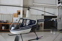 N335DP @ KENW - Robinson R22