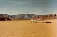 N43961 - On dry lake outside of Death Valley,Ca. Dry lakes are very  nice to land on but be careful for water under the surface or your entire day ( 172s on 5-29-64 & 7-4-75 & C150 on 10-3-71) could be ruined ! Almost happened to me on one- almost- dry lake .