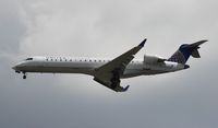 N705SK @ TPA - United Express CRJ-700 - by Florida Metal
