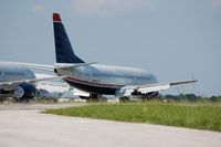 N516AU @ LAL - 1987 Boeing 737-3B7, N516AU at Lakeland Linder Regional Airport, Lakeland, FL - by scotch-canadian