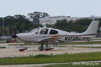 N372BC @ KSRQ - Cirrus SR-22 (N372BC) sits on the ramp at Sarasota-Bradenton International Airport - by Donten Photography