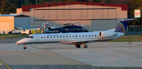 N465VL @ KRIC - S-92 hiding behind commuter jet Richmond - by Ronald Barker