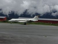N702DM - Sitting in Juneau AK - by Euming Suewing