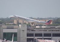 N928AE @ MIA - American E145LR - by Florida Metal