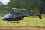 G-BLGV @ EGBT - being used for ferrying race fans to the British F1 Grand Prix at Silverstone - by Chris Hall
