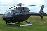G-IGPW @ EGBT - ferrying race fans to the British F1 Grand Prix at Silverstone - by Chris Hall