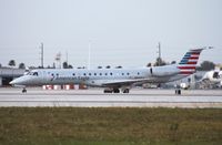 N942LL @ KMIA - EMB-145LR - by Mark Pasqualino