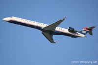 N923FJ @ KSRQ - US Air Flight 2749 operated by Mesa (N923FJ) departs Sarasota-Bradenton International Airport enroute to Charlotte-Douglas International Airport - by Donten Photography