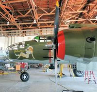 N25YR @ KHYI - 1943 NORTH AMERICAN TB-25N, THE YELLOW ROSE OF TEXAS IN HER HANGER IN SAN MARCOS, TEXAS - by dennisheal