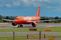 G-EZUI @ EGCC - taxying to stand