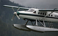 N338AK - Taken while on cruise ship in Ketchikan AK July 5, 2014. Friendly pilot! - by Debbie Silva