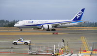 JA827A @ KSEA - Taxiing after landing at Seattle. - by Murray Lundberg