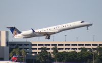 N13202 @ PBI - United Express E145XR - by Florida Metal