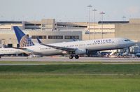 N35407 @ PBI - United 737-900