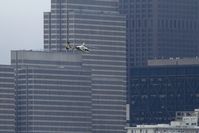 N614G - Eurocopter Flying By Embarcadero Center, San Francisco's Financial District - by SF_Photog