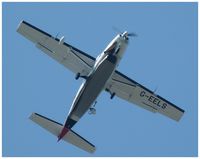 G-EELS - passing overhead whilst photographing the senior open championship at the RPGC Porthcawl,taken from the garden at home during its many circuits. - by brian batters