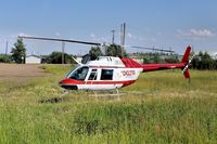 C-FCQJ @ CEX5 - Parked just next to the hotel in Zama City, Alberta - by Guy Pambrun