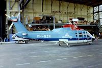 PH-NZN @ EHAM - Sikorsky S-76A+ [760042] (KLM Helicopters) Amsterdam-Schiphol~PH 14/06/1980. From a slide. - by Ray Barber