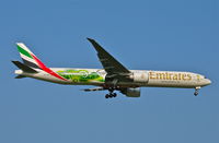 A6-EGE @ IAD - Final Approach to Dulles - by Christopher J. Walker