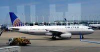 N461UA @ KORD - Taxi O'Hare - by Ronald Barker