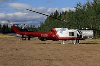 C-GRGA - On standby for forest fire detail in Zama City, Alberta - by Guy Pambrun