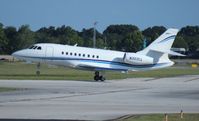 N303CL @ ORL - Falcon 2000
