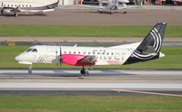 N304AG @ TPA - Silver Saab 340 - by Florida Metal